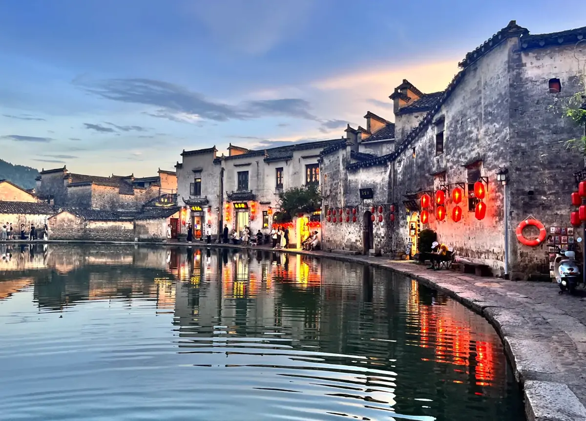 Capture the Classic Reflection of Hongcun at Moon Pond.webp
